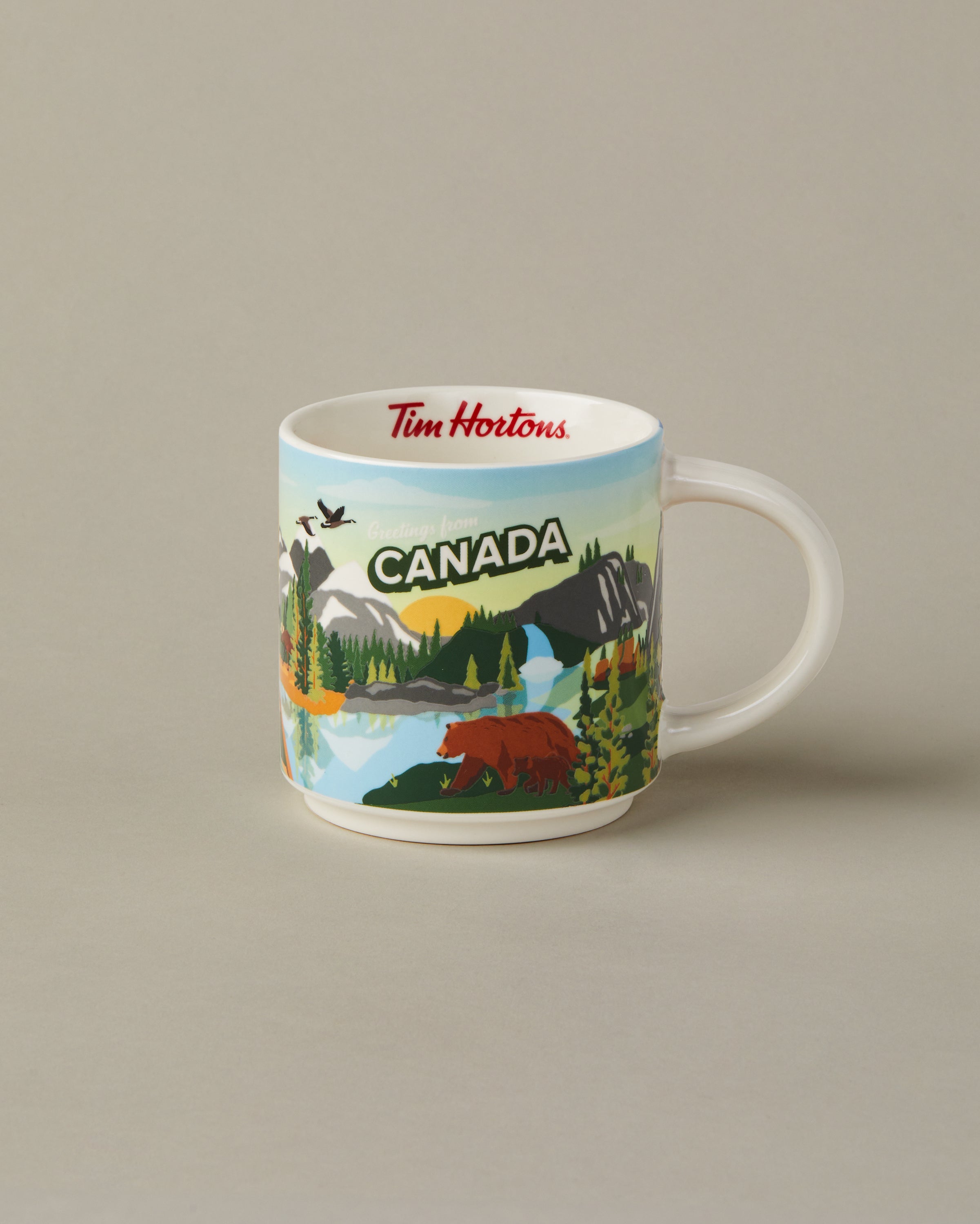 16oz ceramic Tim Hortons mug with Canada landscape design | Tasse Tim Hortons de 16 oz représentant des paysages canadiens. - Image #1