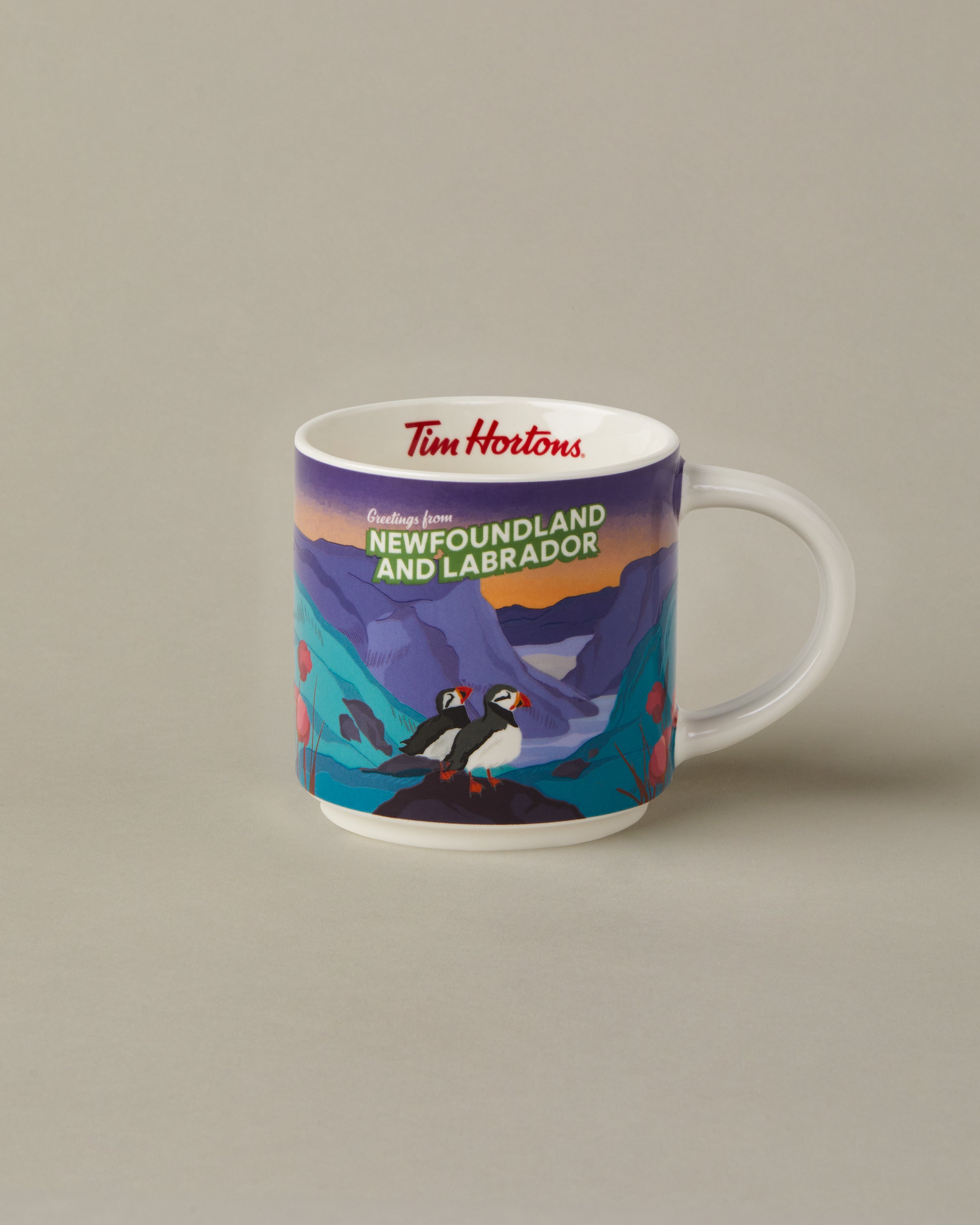 16oz ceramic Tim Hortons mug with Newfoundland and Labrador landscape design | Tasse Tim Hortons de 16 oz représentant des paysages de Terre-Neuve-et-Labrador. - Image #1