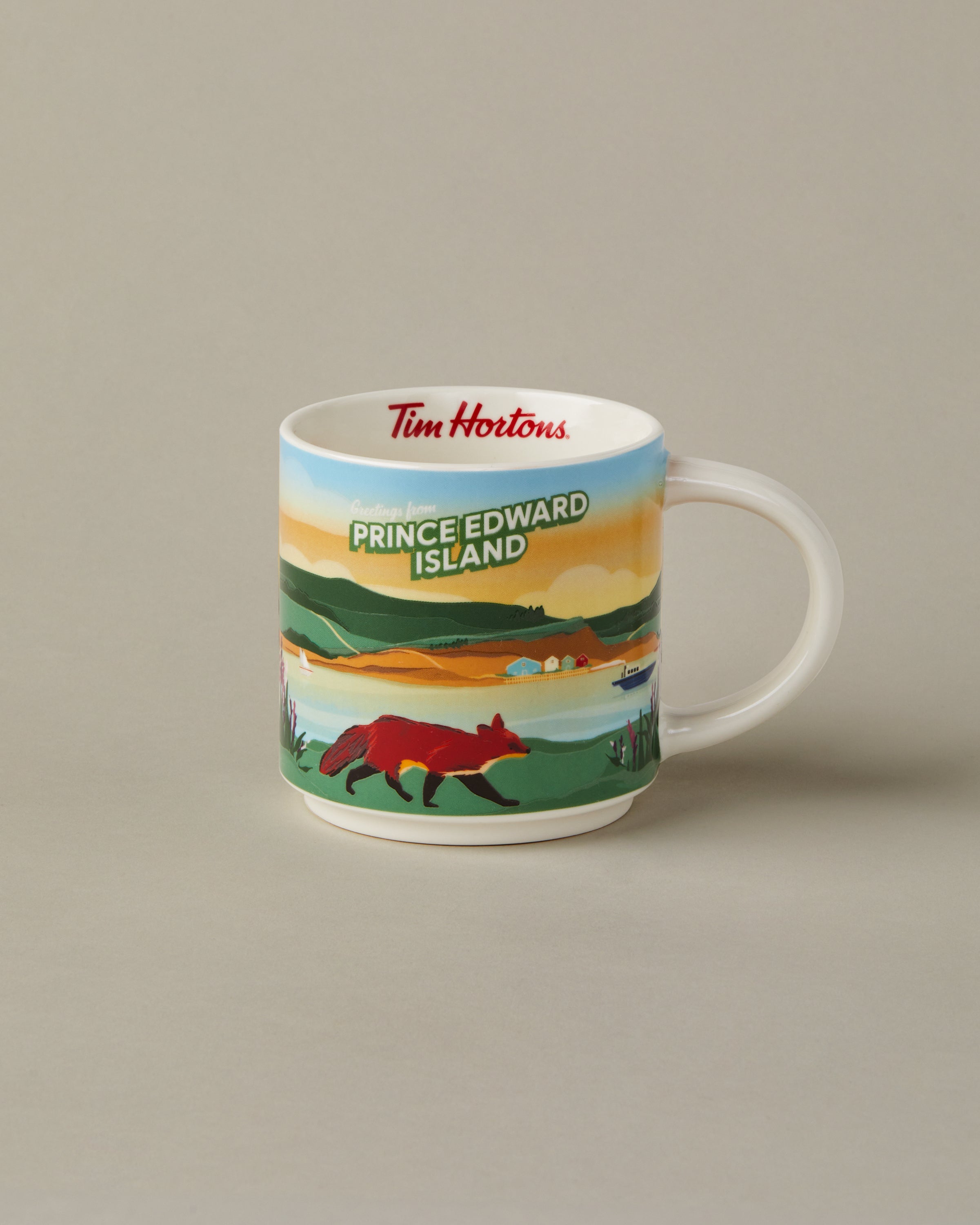 16oz ceramic Tim Hortons mug with Prince Edward Island landscape design | Tasse Tim Hortons de 16 oz représentant des paysages de l’Île-du-Prince-Édouard. - Image #1