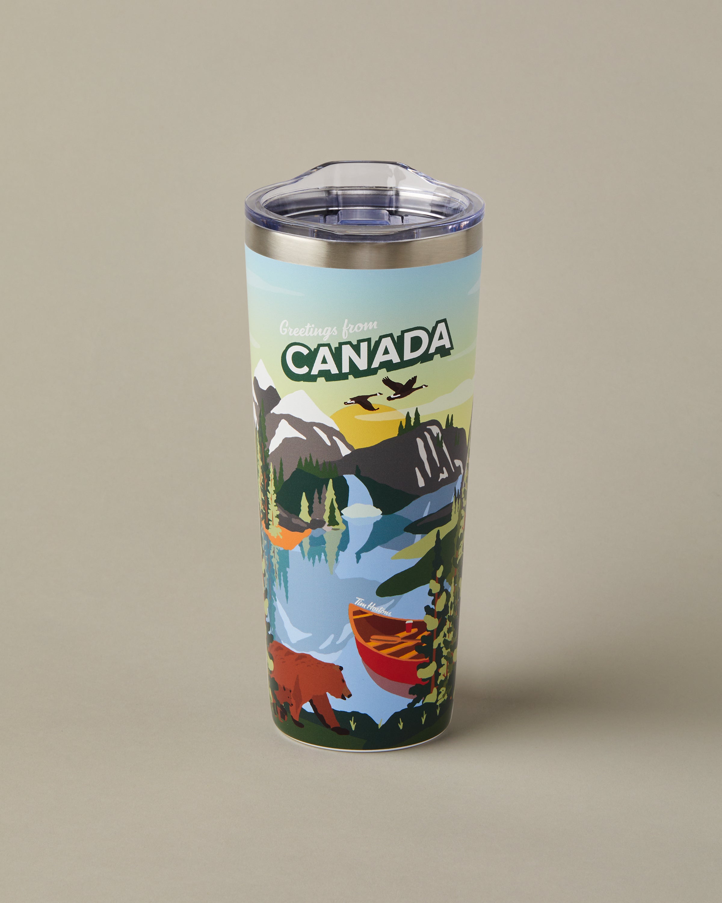 22oz stainless steel Tim Hortons travel mug with Canada landscape design, insulated for hot and cold drinks | Gobelet de voyage en acier inoxydable Tim Hortons de 22 oz représentant des paysages du Canada, isotherme pour boissons chaudes et froides. - Image #2