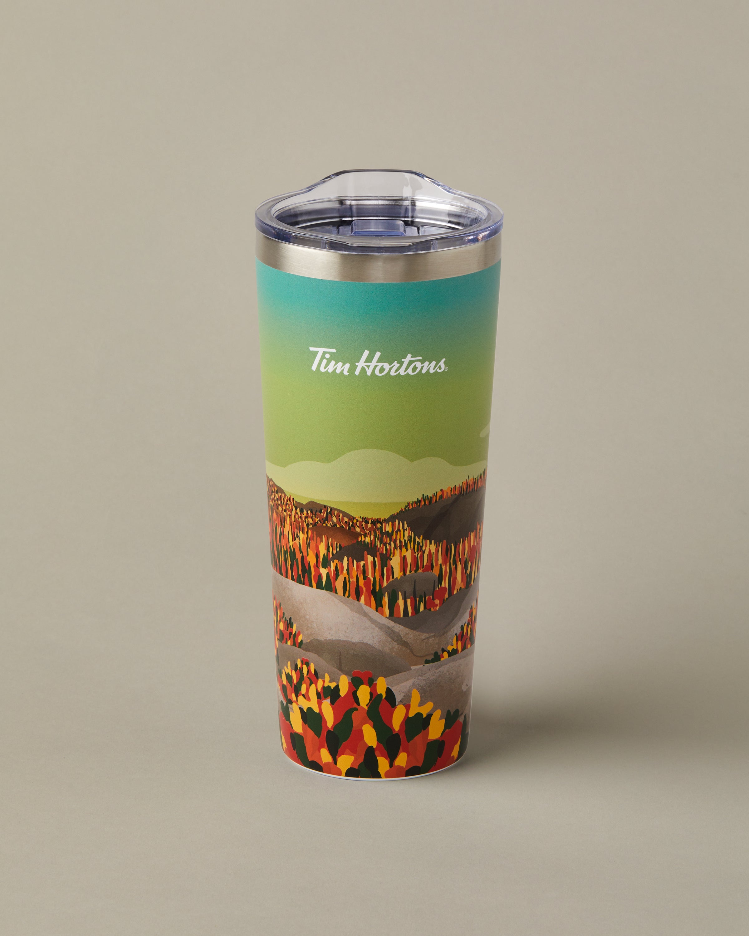 22oz stainless steel Tim Hortons travel mug with Manitoba landscape design, insulated for hot and cold drinks | Gobelet de voyage en acier inoxydable Tim Hortons de 22 oz représentant des paysages du Manitoba, isotherme pour boissons chaudes et froides. - Image #2