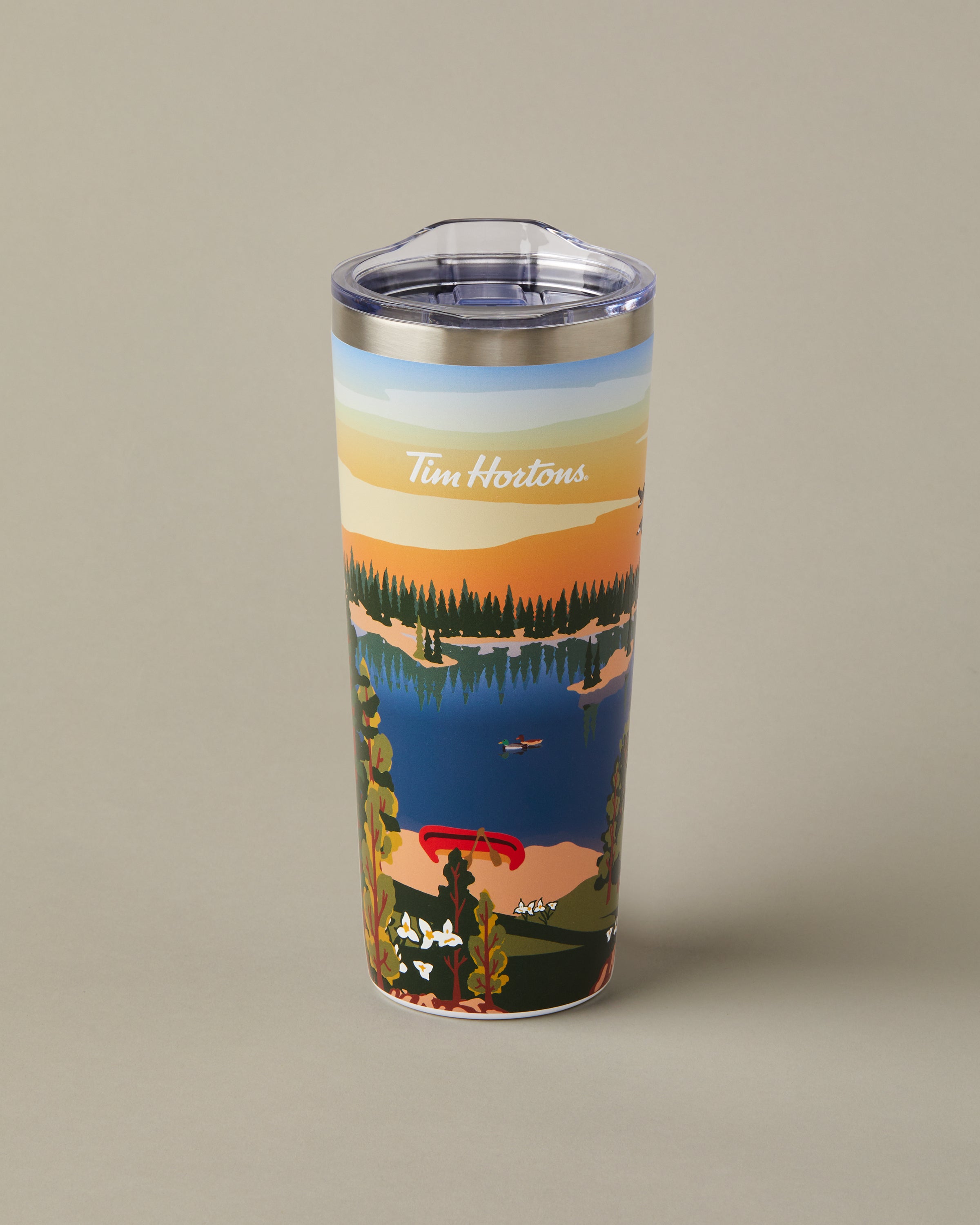 22oz stainless steel Tim Hortons travel mug with Ontario landscape design, insulated for hot and cold drinks | Gobelet de voyage en acier inoxydable Tim Hortons de 22 oz représentant des paysages de l’Ontario, isotherme pour boissons chaudes et froides. - Image #2
