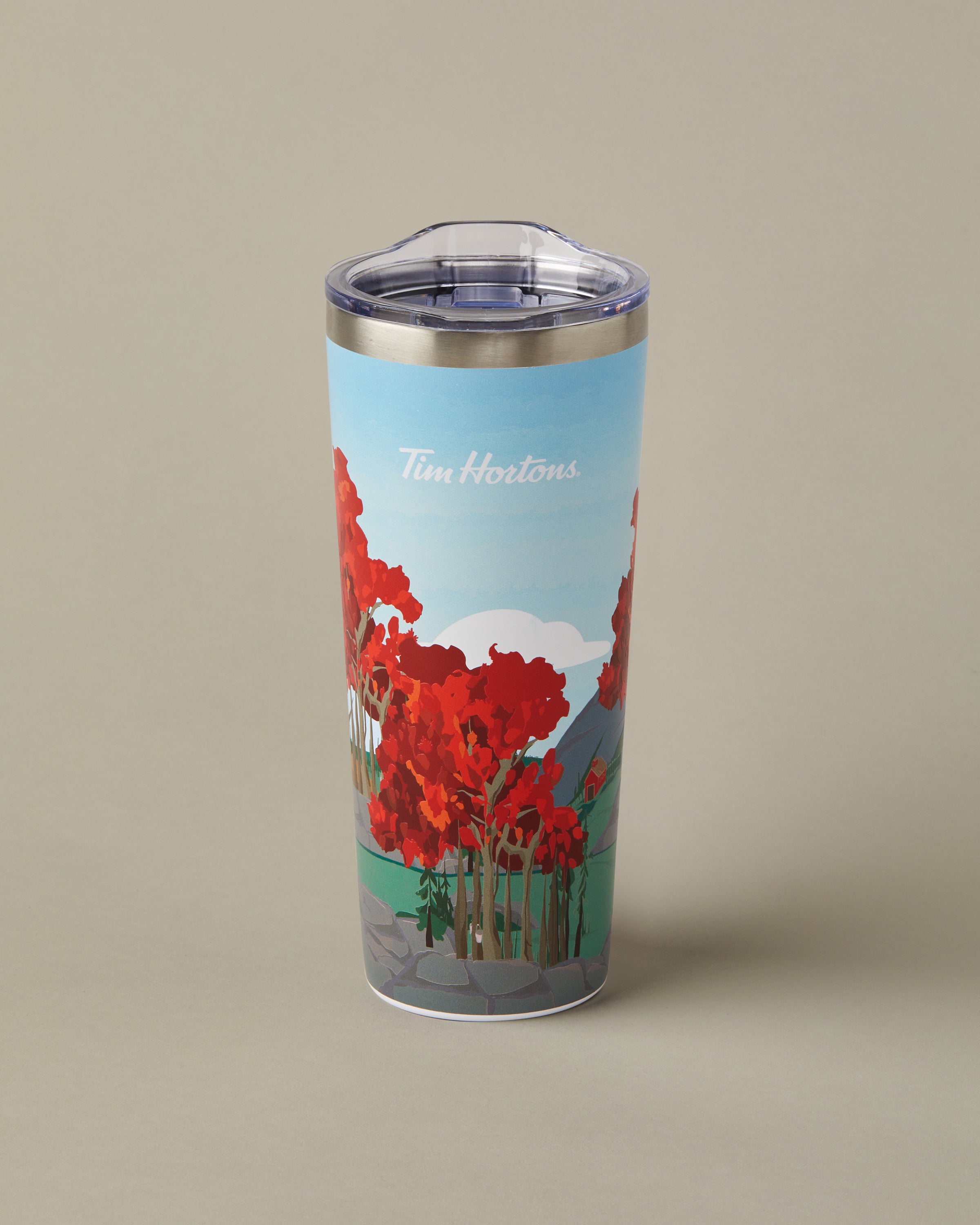 22oz stainless steel Tim Hortons travel mug with Quebec landscape design, insulated for hot and cold drinks | Gobelet de voyage en acier inoxydable Tim Hortons de 22 oz représentant des paysages du Québec, isotherme pour boissons chaudes et froides. - Image #2