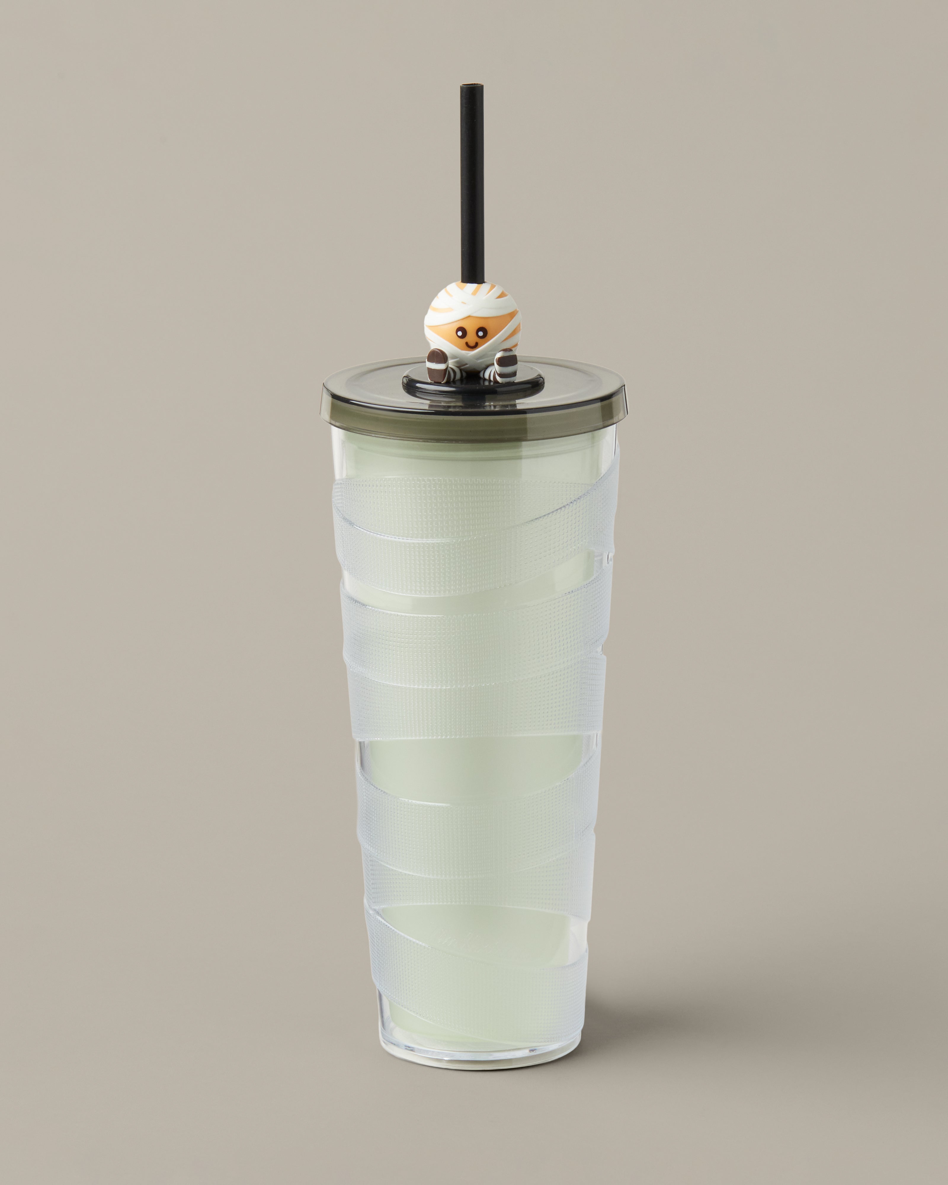 Green and purple 24oz plastic straw tumbler with a glow-in-the-dark Timbits® Mummy topper. | Gobelet en plastique vert et mauve de 24 oz avec paille, avec décoration momie TimbitsMD phosphorescente. - Image #4