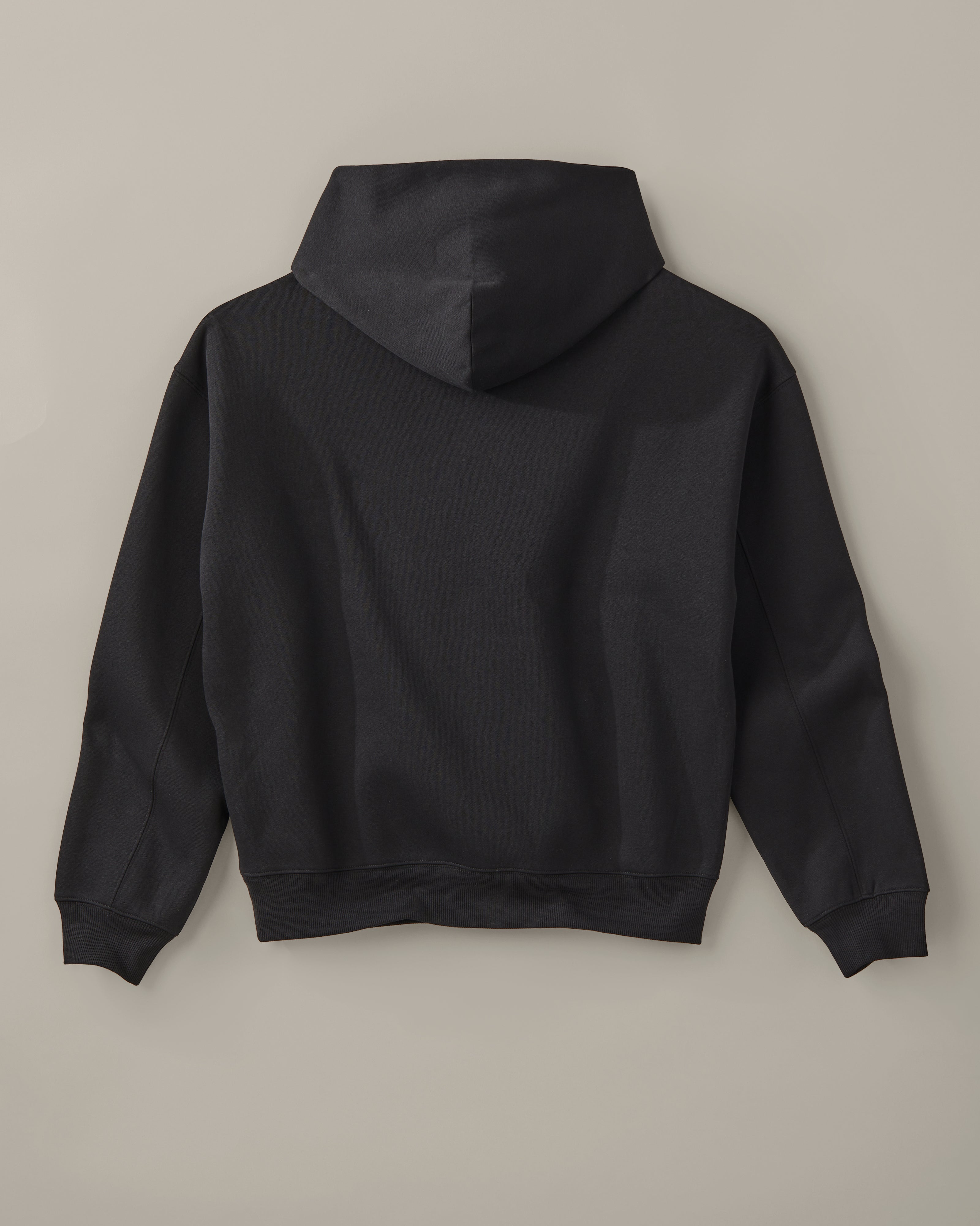 Black unisex pullover hoodie with a small white Barely Alive graphic on the chest. | Chandail à capuchon unisexe noir avec design « Barely Alive » sur le torse. - Image #5