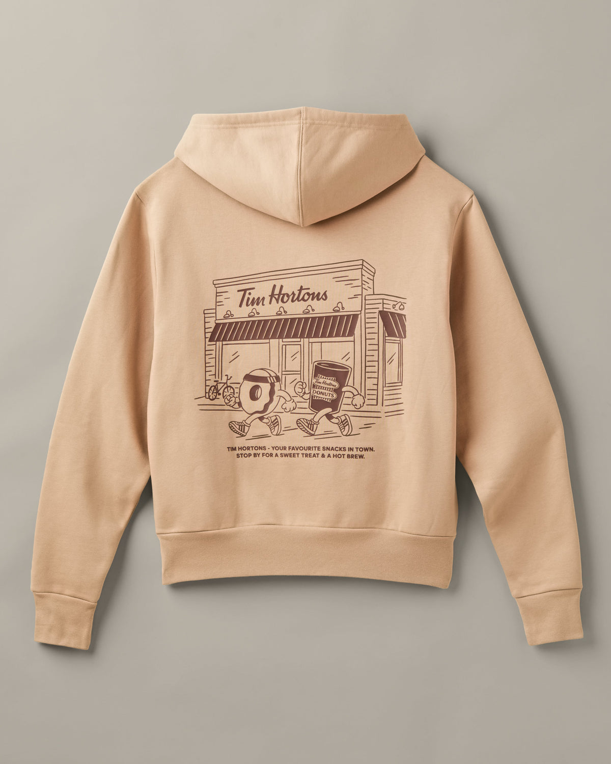 Cream adidas® pullover hoodie with a Tims Run Club donut character on the chest, kangaroo pocket, and co-branded patch. - Image #3