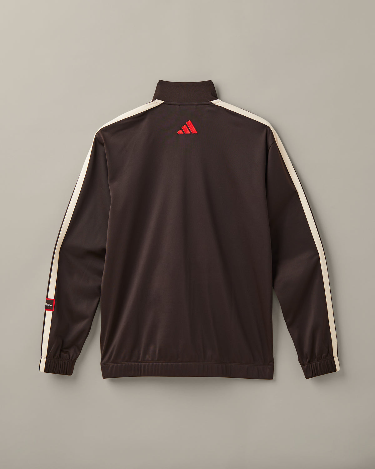 Men’s espresso-brown adidas® track top with a cream front zipper, cream 3-Stripes, and a Tims Run Club chest graphic. - Image #2