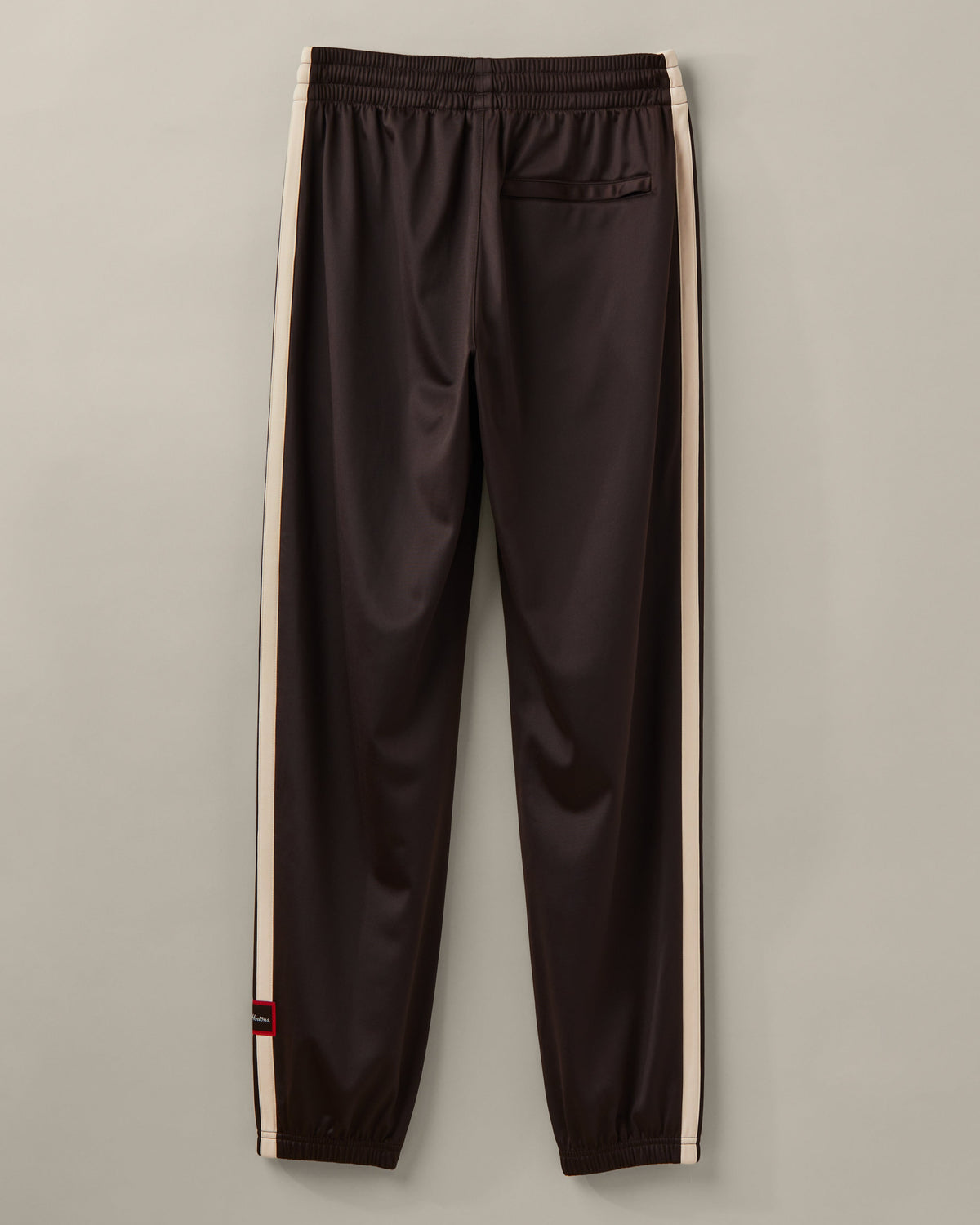 Men’s espresso-brown adidas® track pants with cream 3-Stripes and adidas® x Tim Hortons collaboration details. - Image #3