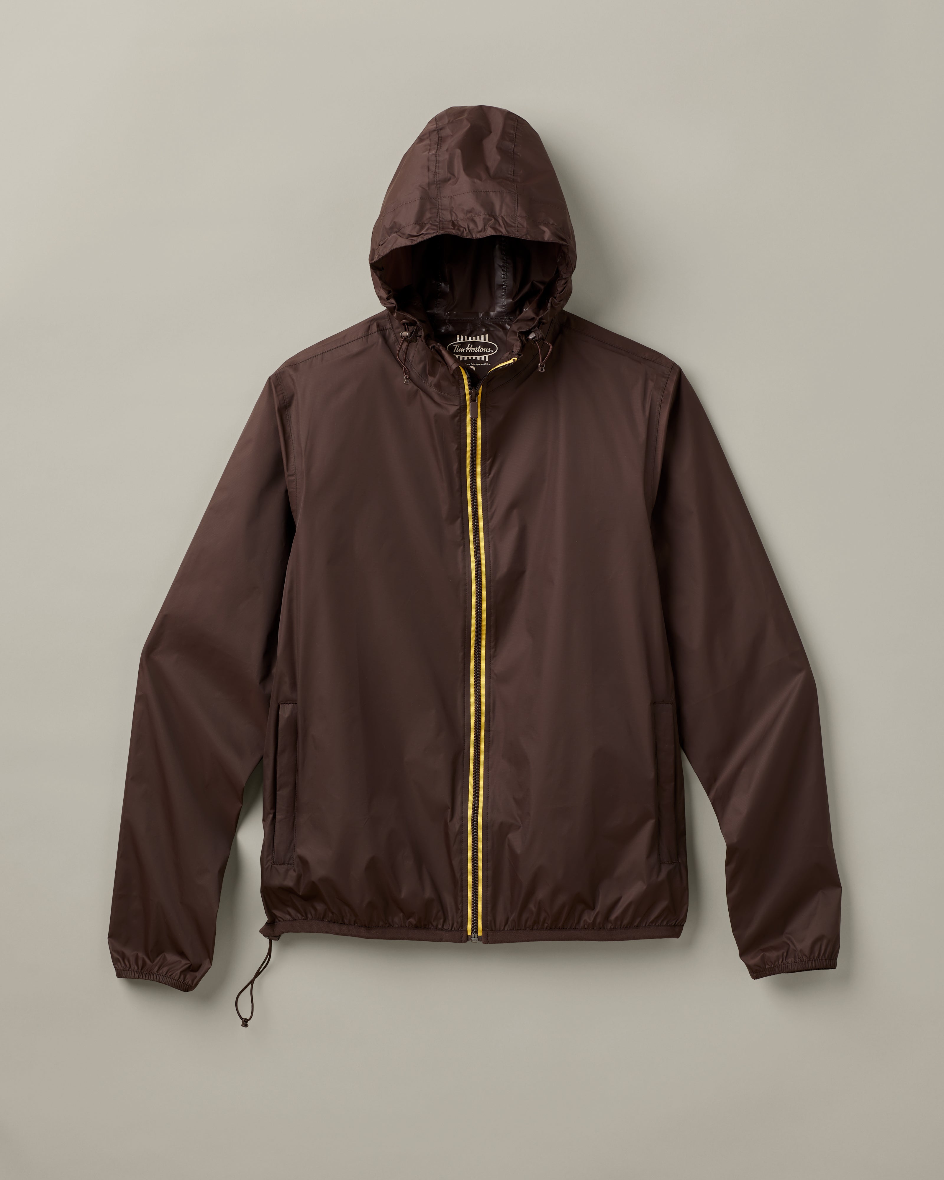 Espresso-coloured unisex packable jacket featuring retro Tim Hortons logo | Veste compressible unisexe espresso avec logo Tim Hortons rétro. - Image #6