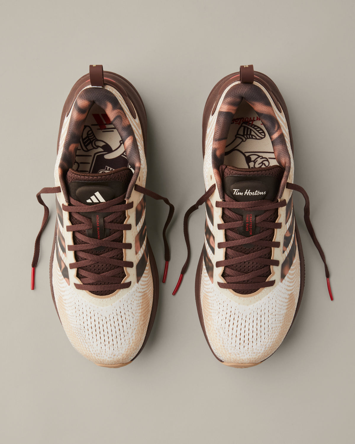 Women’s adidas® Supernova Ease running shoes in cream and coffee-brown shades with patterned 3-Stripes and Tim Hortons details. - Image #5
