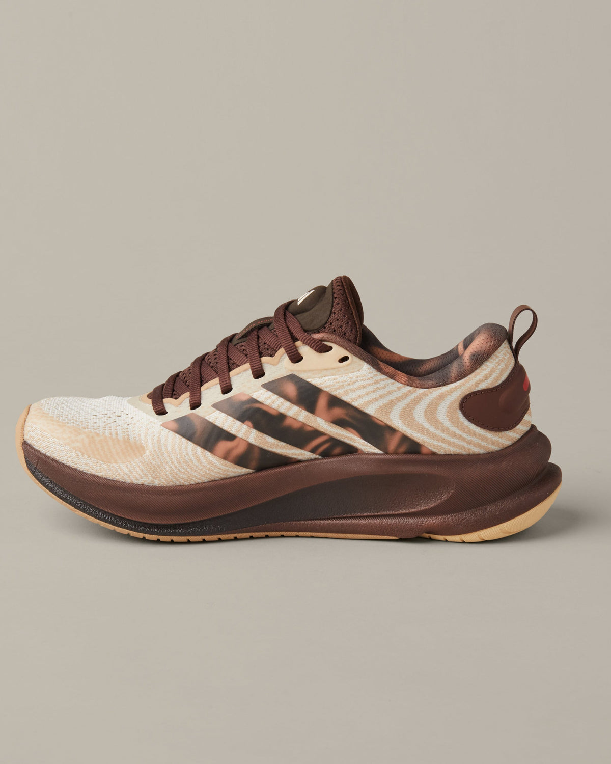 Women’s adidas® Supernova Ease running shoes in cream and coffee-brown shades with patterned 3-Stripes and Tim Hortons details. - Image #3