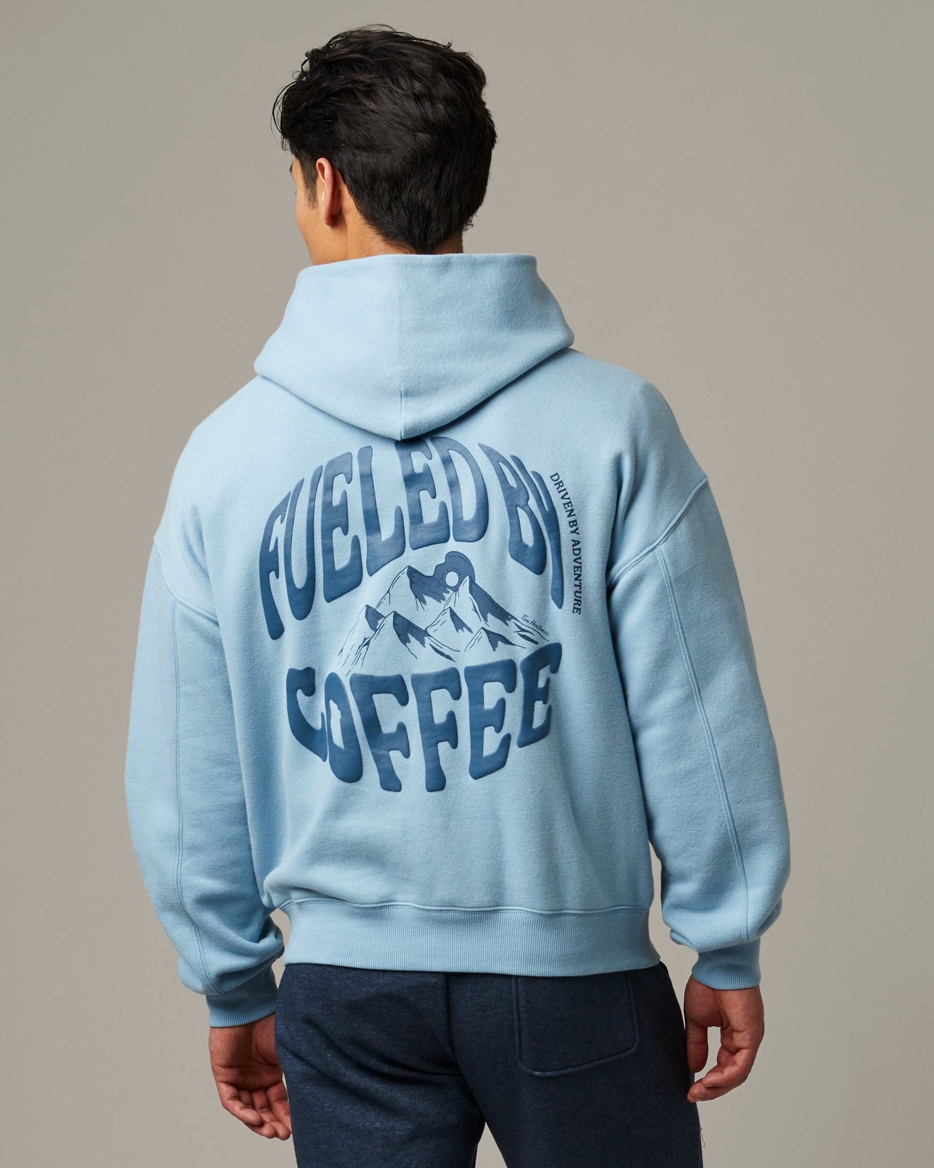 Light blue unisex hoodie featuring Fueled by Coffee graphic | Light blue unisex hoodie featuring Fueled by Coffee graphic. - Image #3