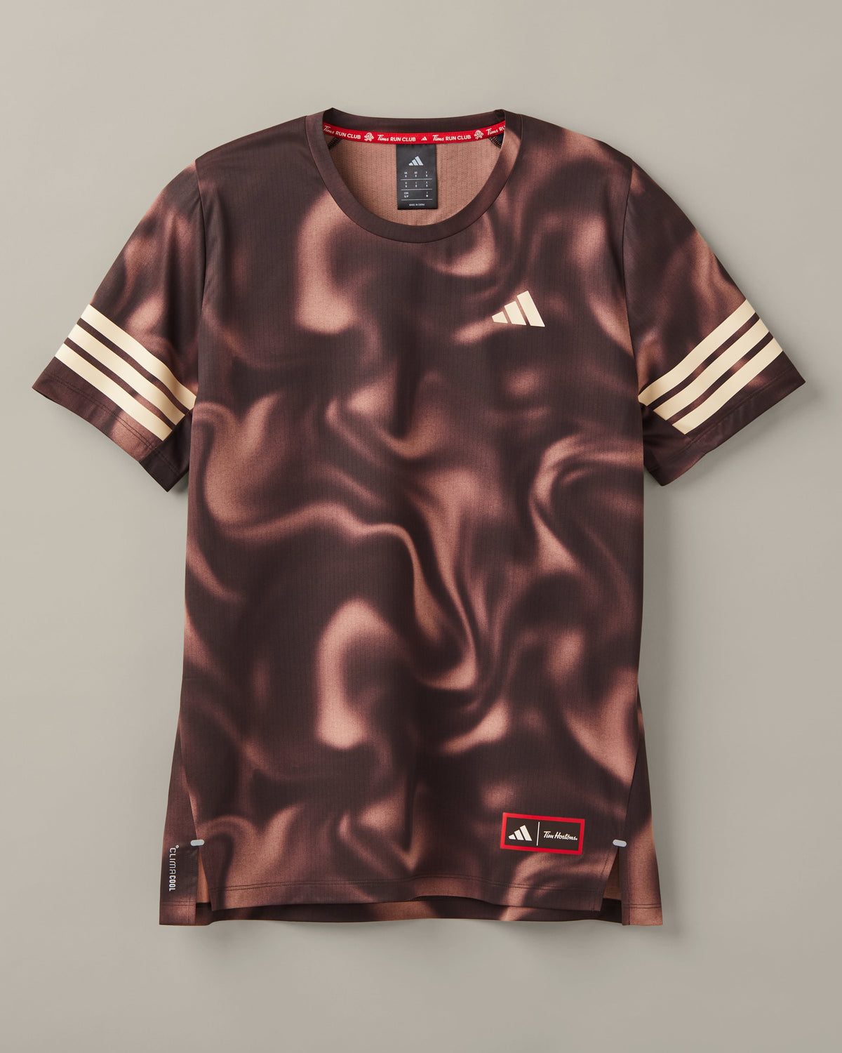 Espresso-brown adidas® CLIMACOOL T-shirt with cream sleeve stripes and a Tims Run Club coffee-and-donut graphic. - Image #2