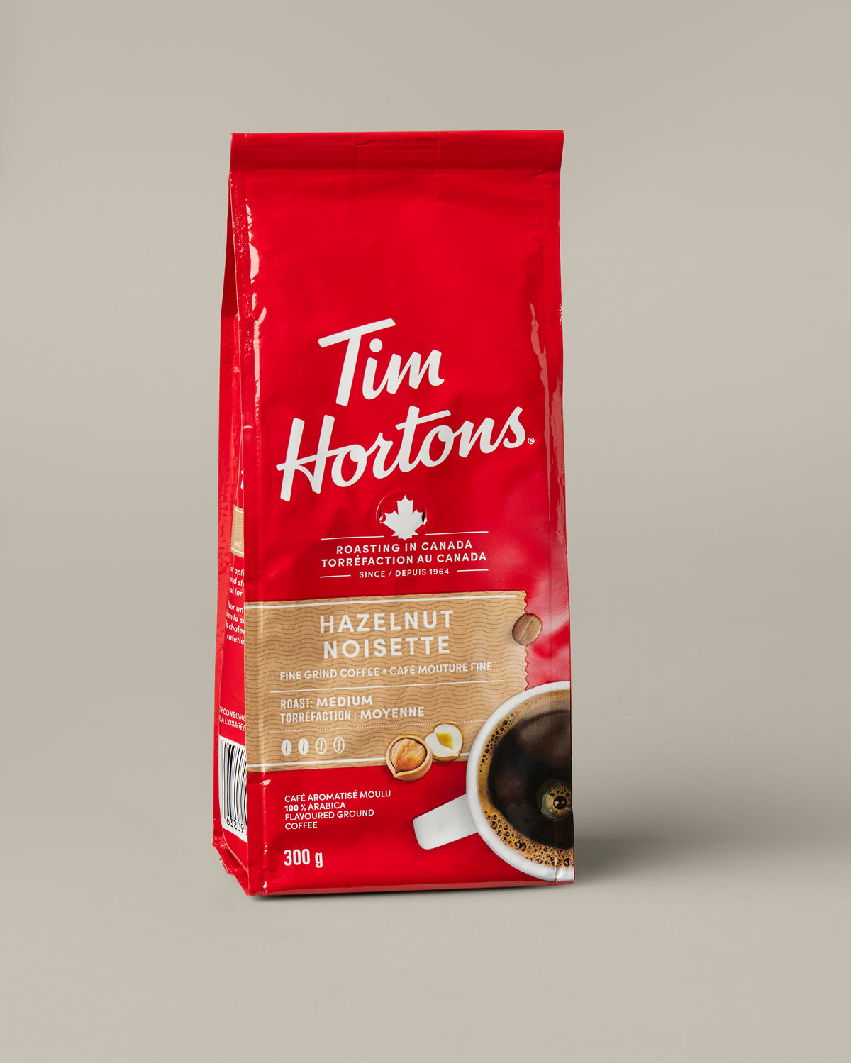 Tim Hortons Hazelnut Ground Coffee in a 300g bag. | Café moulu à la noisette Tim Hortons en sac de 300 g. - Image #1
