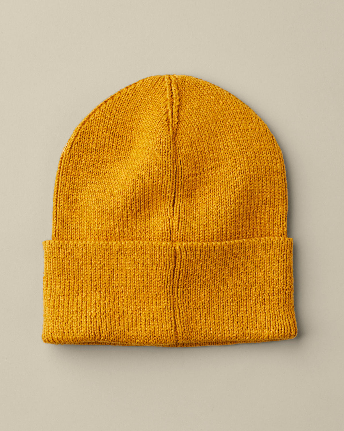 Mustard yellow rib-knit Tim Hortons toque with a folded cuff and square Always Fresh logo patch. | Tuque Tim Hortons jaune moutarde en tricot côtelé, avec revers et écusson carré au logo Toujours frais. - Image #3