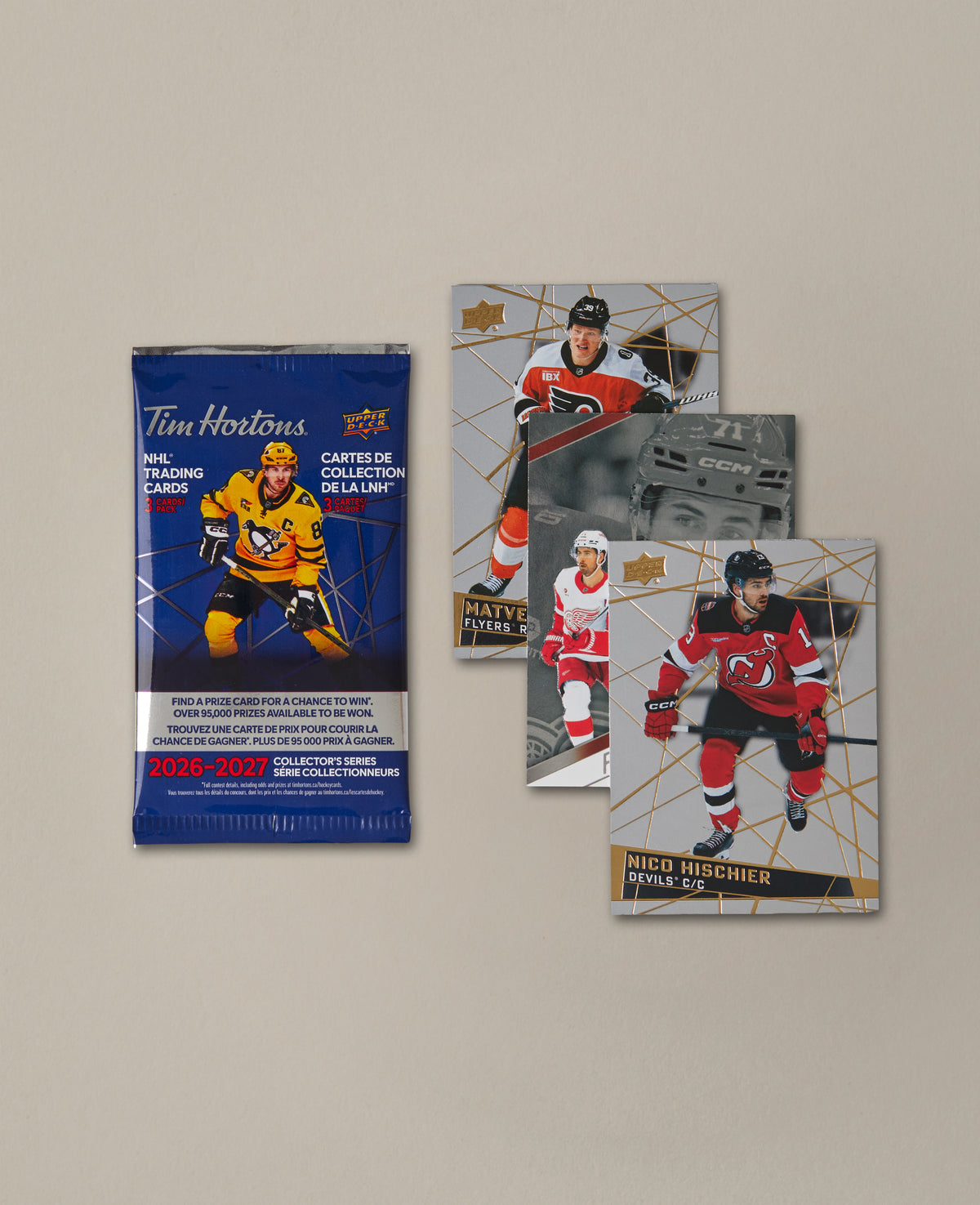 A Tim Hortons NHL trading cards collector's series pack featuring a blue background with a hockey player graphic and text for 2026-2027. - Image #2