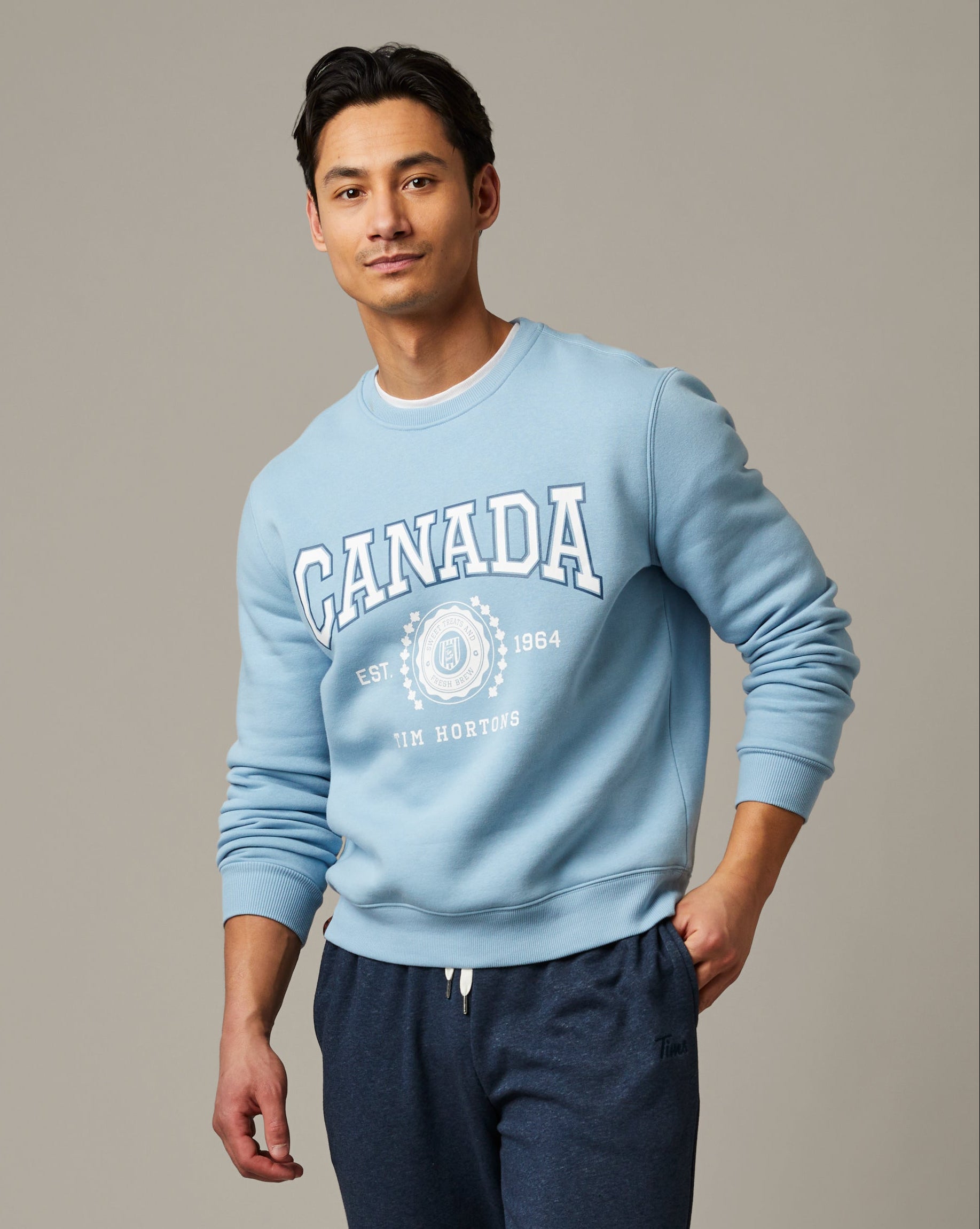 Light blue unisex crewneck sweatshirt featuring Canada design | Chandail ras-de-cou unisexe bleu clair avec motif canadien. - Image #1