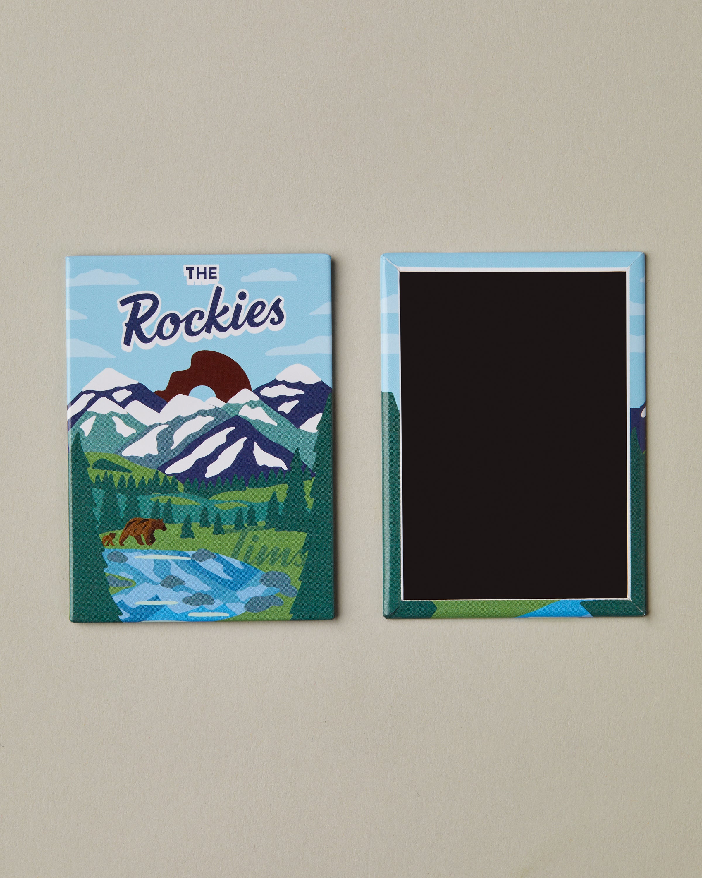 Graphic art magnet featuring The Rockies stylized landscape with Tim Hortons iconography | Aimant au design artistique mettant en vedette des paysages stylisés des Rocheuses et l’iconographie de Tim Hortons. - Image #1
