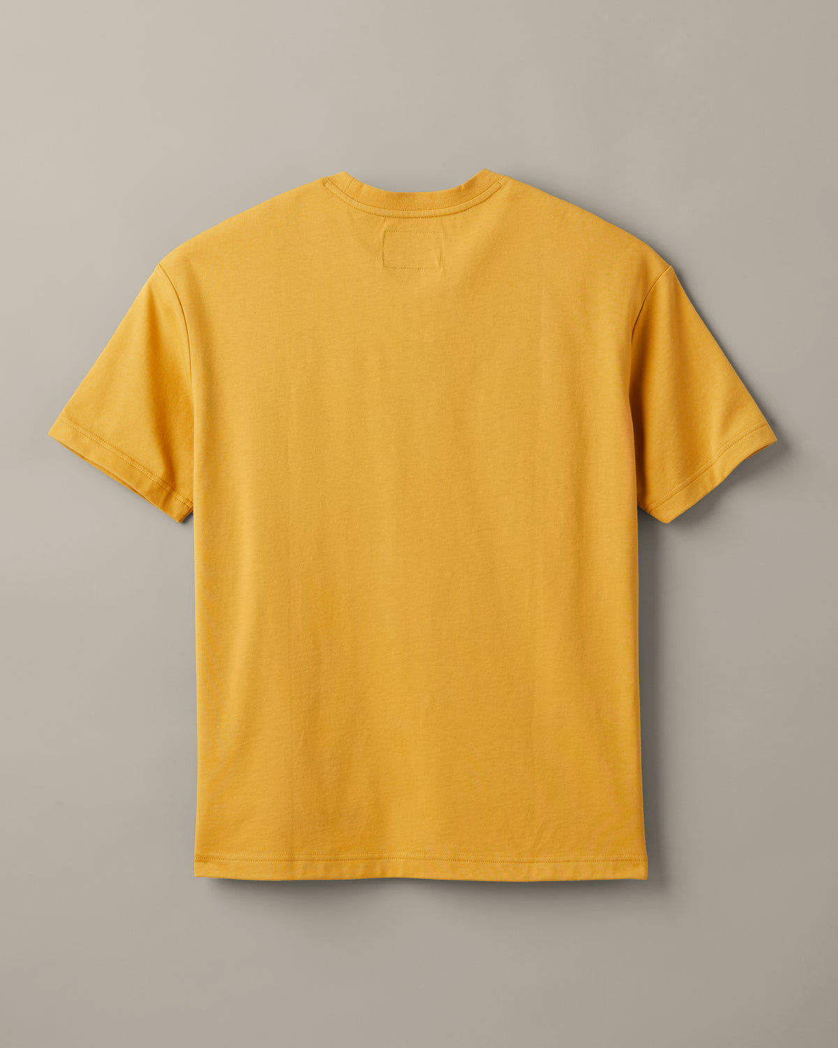 Ochre Tim Hortons crew-neck T-shirt with a small Pick Up Some Tims crane and coffee cup graphic on the chest. | T-shirt Tim Hortons ocre à encolure ronde avec une petite illustration de grue et de gobelet de café « Prendre son Tim » sur la poitrine. - Image #4