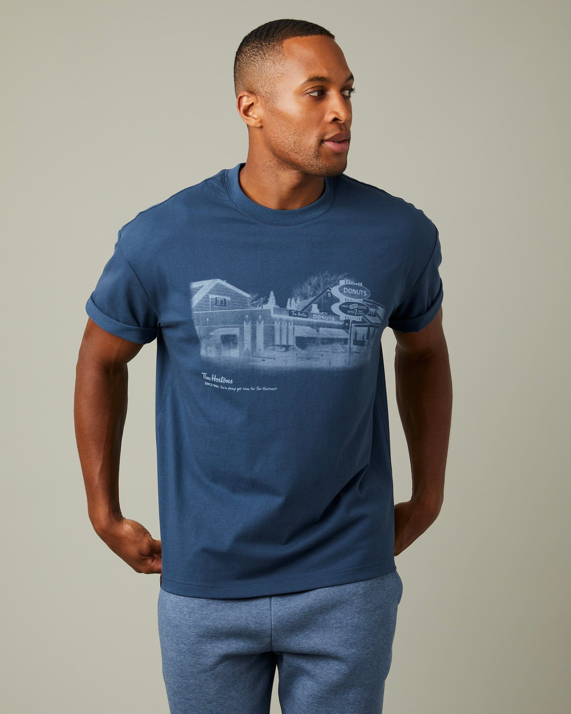 Navy blue T-shirt with vintage Tim Hortons Store #1 graphic | T-shirt bleu marine avec une image rétro d’un magasin Tim Hortons - Image #1